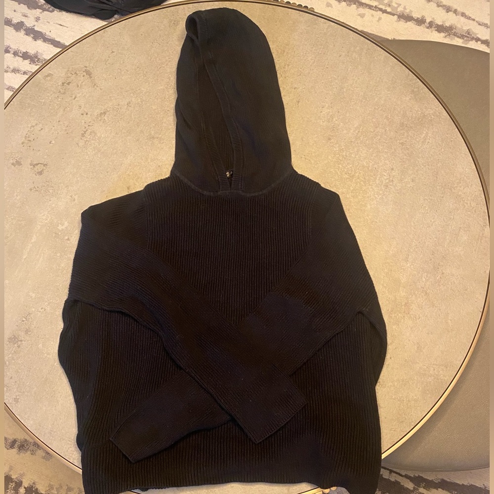 ATHLETA SWEATER WITH A HOODIE.

It is definitely worn in but great material